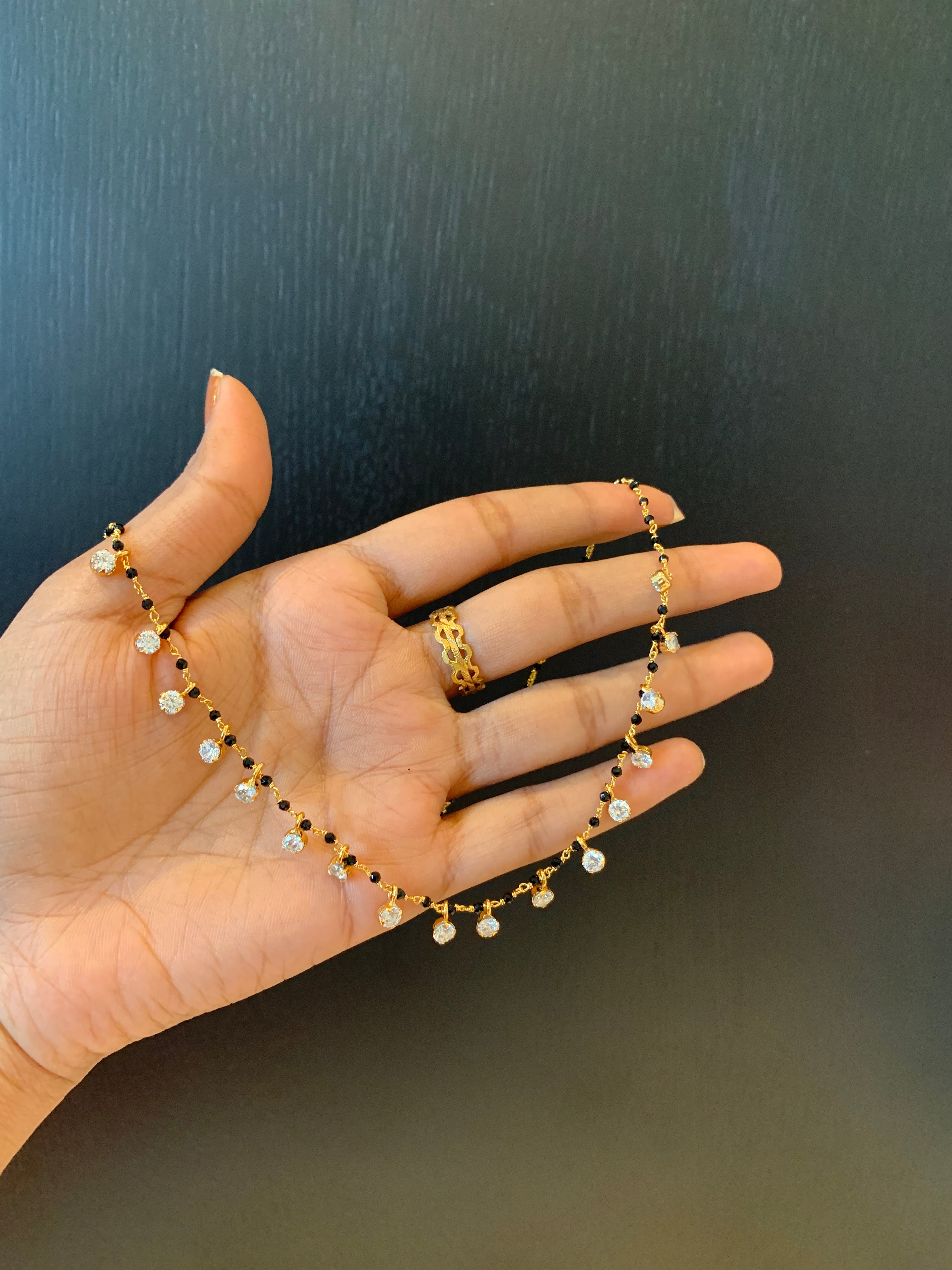 Real gold design black beads